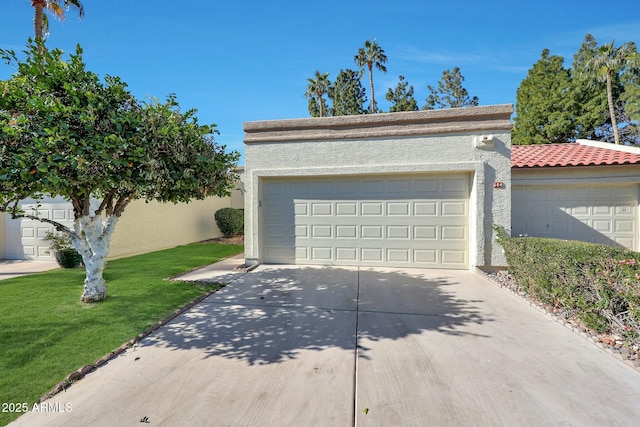 garage featuring a yard