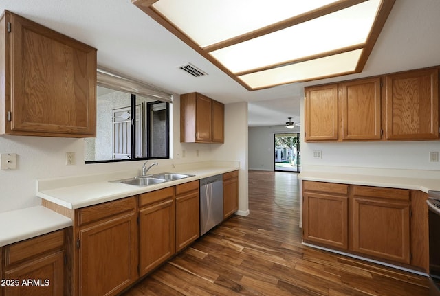 kitchen with dishwasher, stove, sink, dark hardwood / wood-style floors, and ceiling fan