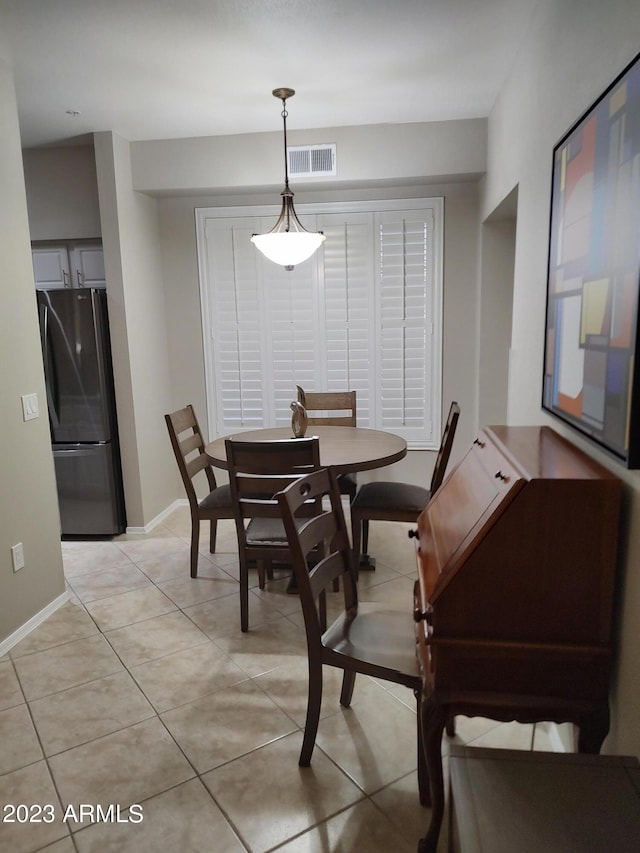 view of tiled dining area