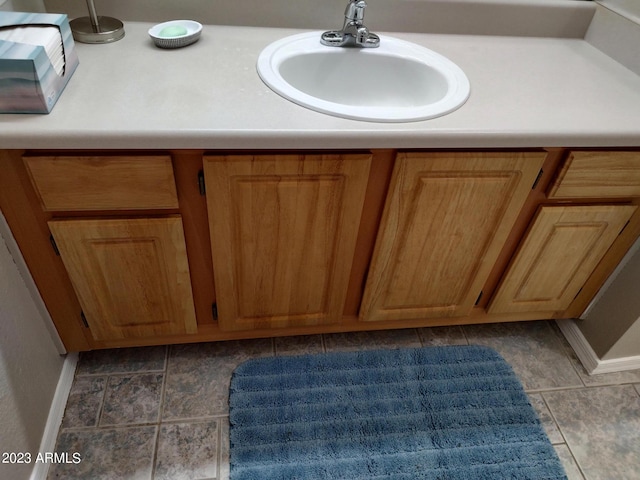 bathroom featuring sink and tile patterned floors