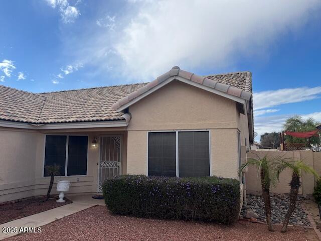 single story home with stucco siding