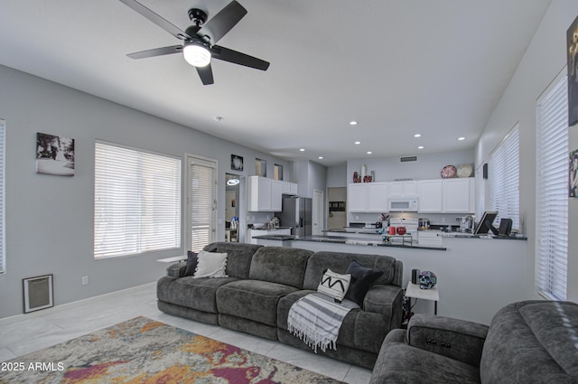 living room featuring ceiling fan