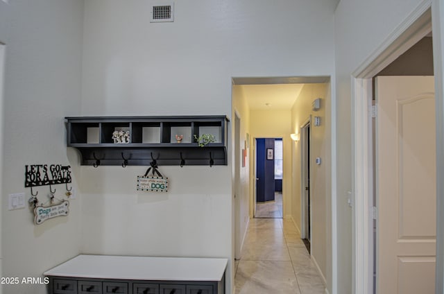 mudroom featuring light tile patterned floors