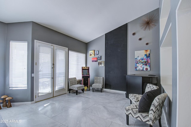 living area with vaulted ceiling