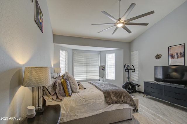 bedroom with vaulted ceiling and ceiling fan