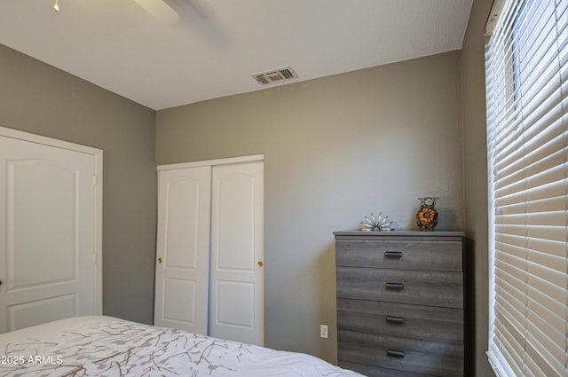 bedroom with a closet and ceiling fan