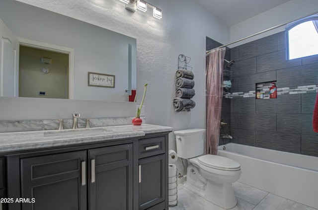 full bathroom with vanity, toilet, and shower / bath combo with shower curtain