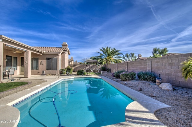 view of pool with a patio