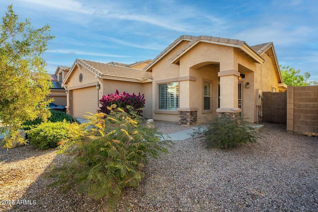 view of front of home with a garage