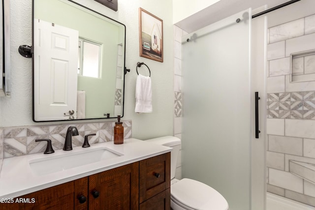 4712 W Juniper Ave, Glendale, AZ 85306 - bathroom featuring a walk in shower, decorative backsplash, and vanity