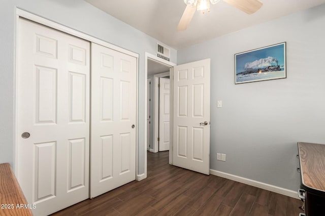 4712 W Juniper Ave, Glendale, AZ 85306 - unfurnished bedroom with dark wood-style floors, a closet, and ceiling fan