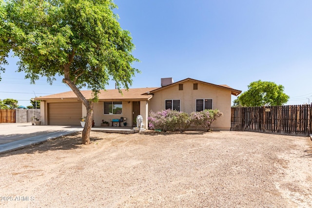 4712 W Juniper Ave, Glendale, AZ 85306 - single story home featuring concrete driveway, an attached garage, and stucco siding