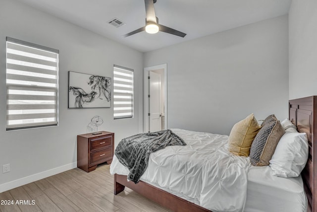 bedroom featuring ceiling fan and light hardwood / wood-style floors