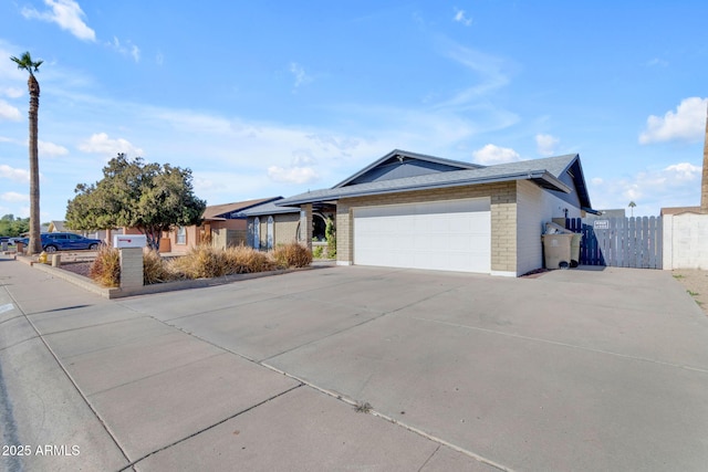 ranch-style home with a garage