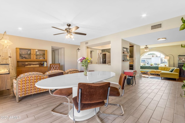 dining area with ceiling fan