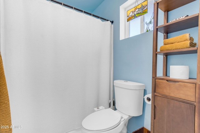 bathroom featuring toilet