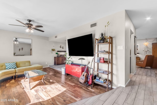 living room with ceiling fan