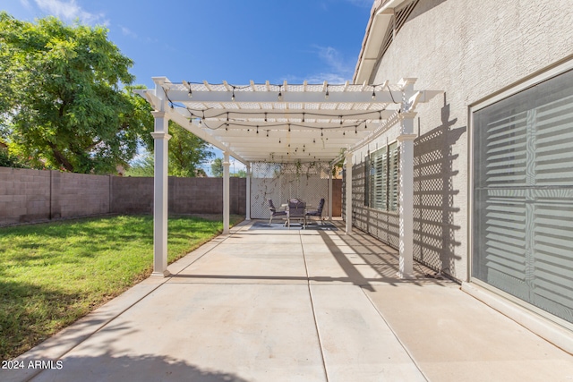 view of patio featuring a pergola