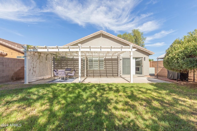 back of house featuring a pergola, central air condition unit, a yard, and a patio