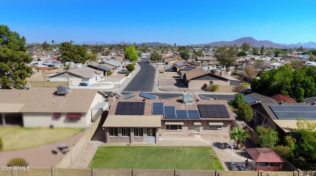 birds eye view of property with a residential view and a mountain view