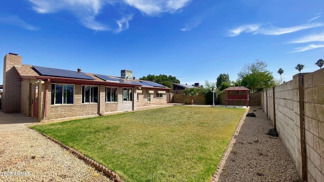 view of yard with a gazebo, a patio, and a fenced backyard