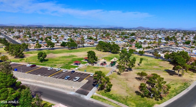 bird's eye view with a residential view and a mountain view