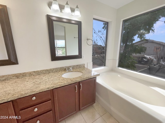 unfurnished bedroom featuring a spacious closet, a closet, baseboards, and carpet floors