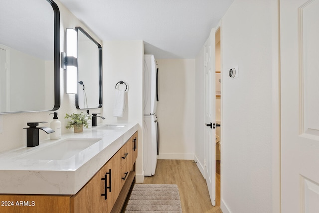 bathroom featuring hardwood / wood-style flooring and vanity