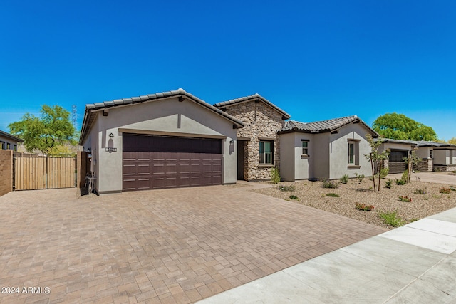 view of front of home featuring a garage