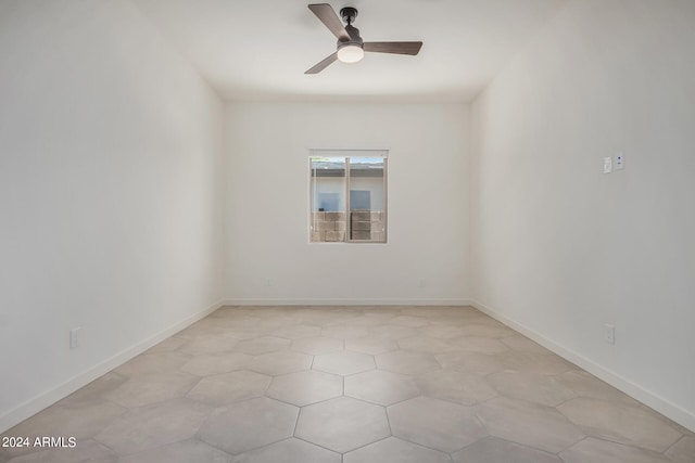 spare room with ceiling fan