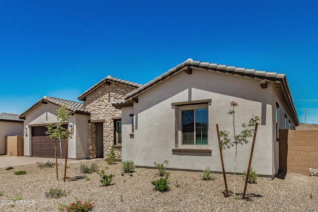 view of front of house with a garage