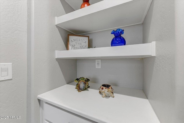 interior details with a textured wall