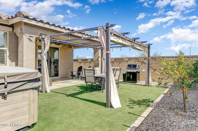 exterior space featuring area for grilling, a pergola, and a fenced backyard