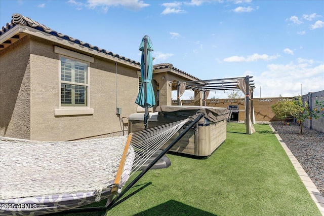 view of yard with a pergola and a fenced backyard