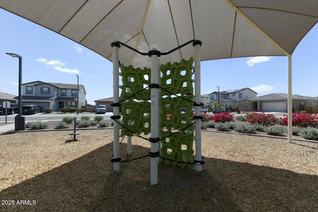 view of playground with a residential view
