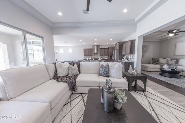 15248 S 182nd Ln, Goodyear, AZ 85338 - living area with recessed lighting, a ceiling fan, and light wood finished floors