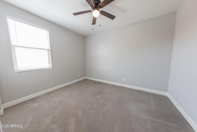 15248 S 182nd Ln, Goodyear, AZ 85338 - carpeted spare room featuring a ceiling fan and baseboards
