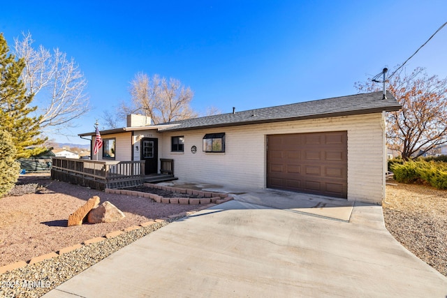 ranch-style home with a garage