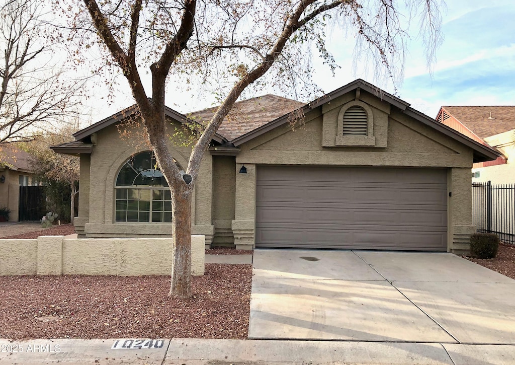 single story home with a garage