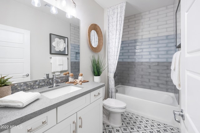 full bathroom with shower / bathtub combination with curtain, vanity, and toilet