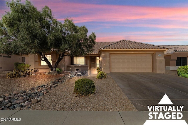 view of front of house with a garage