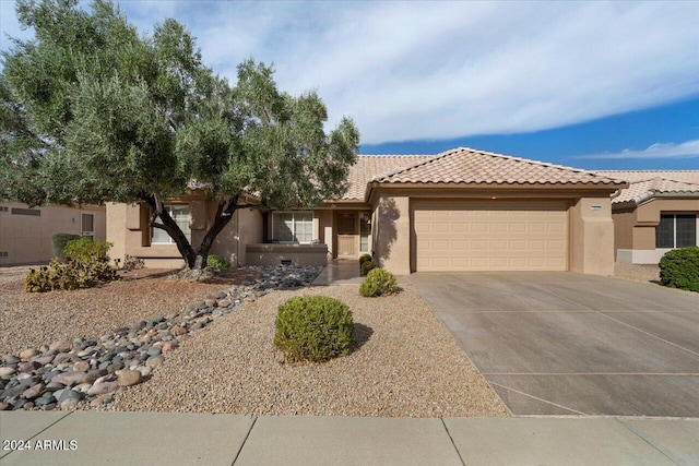 view of front of home featuring a garage