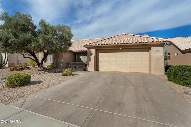 view of front of property featuring a garage