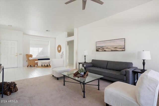 tiled living room featuring ceiling fan