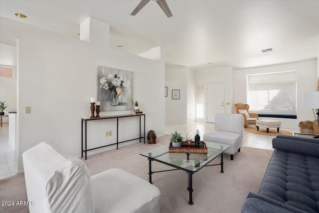 living room with light tile patterned floors and ceiling fan