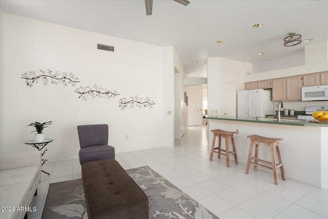 tiled living room with sink