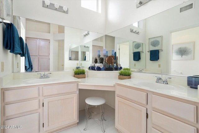 bathroom with vanity and tile patterned floors