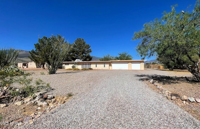5332 S Apache Ave, Sierra Vista, AZ 85650 - view of front facade featuring a mountain view and a garage