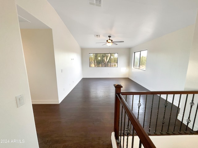 interior space featuring dark hardwood / wood-style floors and ceiling fan