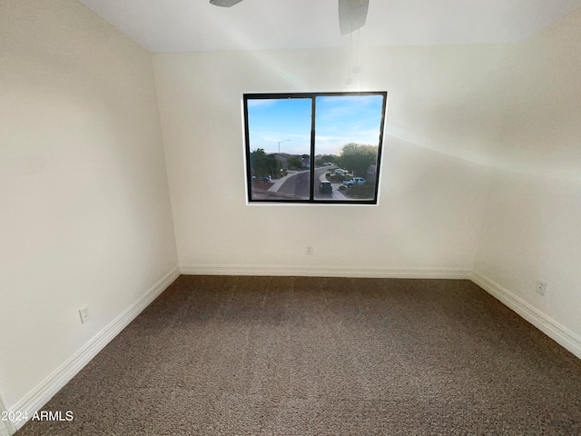 carpeted empty room with ceiling fan